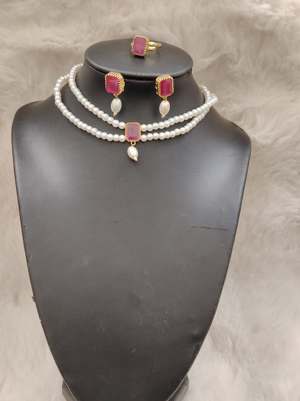 Beautiful hyderabadi pearl set with magenta stone