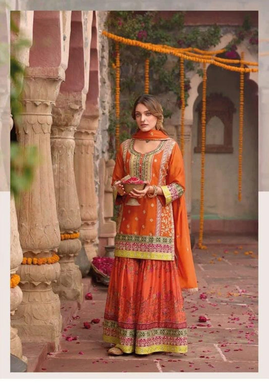 Orange color sharara set with digital prints and aari embroidery