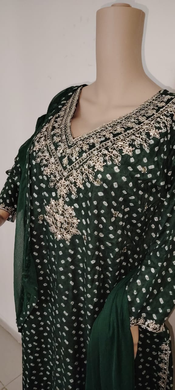 Bandhni print salwar kameez with dupatta.