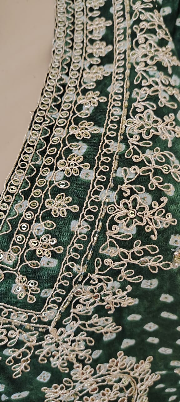 Bandhni print salwar kameez with dupatta.