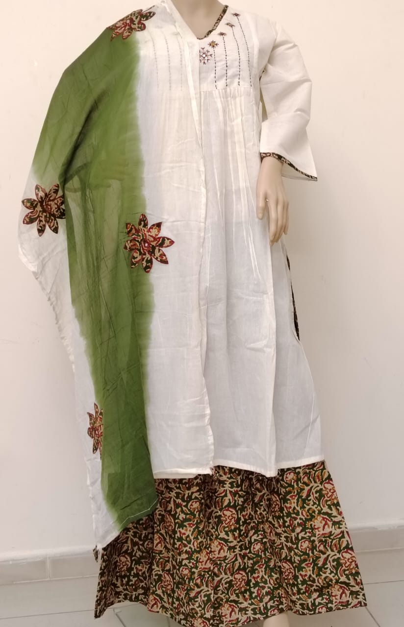 Offwhite kora cotton kurta paired with green ajrakh palazzo and dyed applique mul dupatta