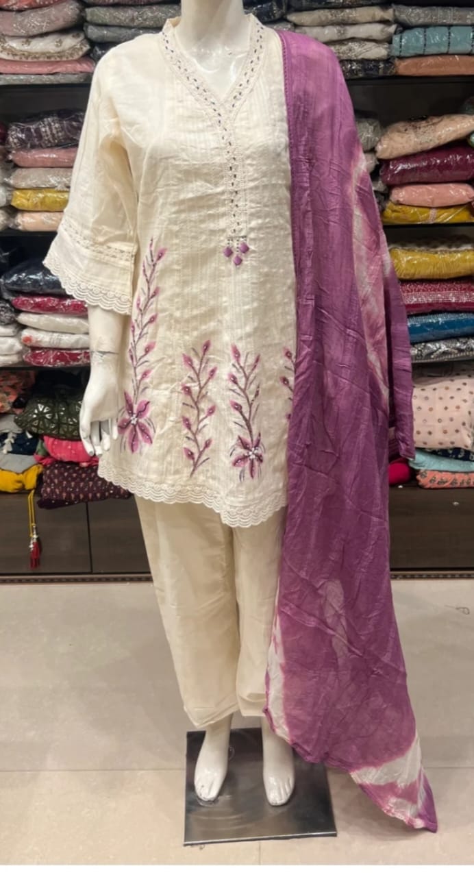 Off-white kora cotton short kurti and pant set with dyed dupatta.