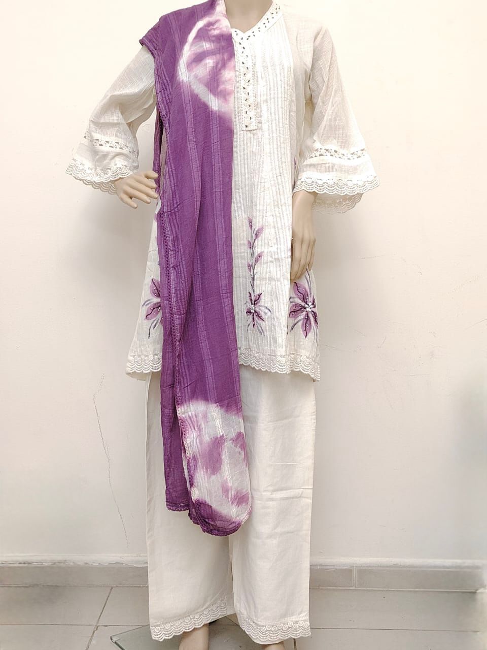 Off-white kora cotton short kurti and pant set with brush paint and dyed dupatta.