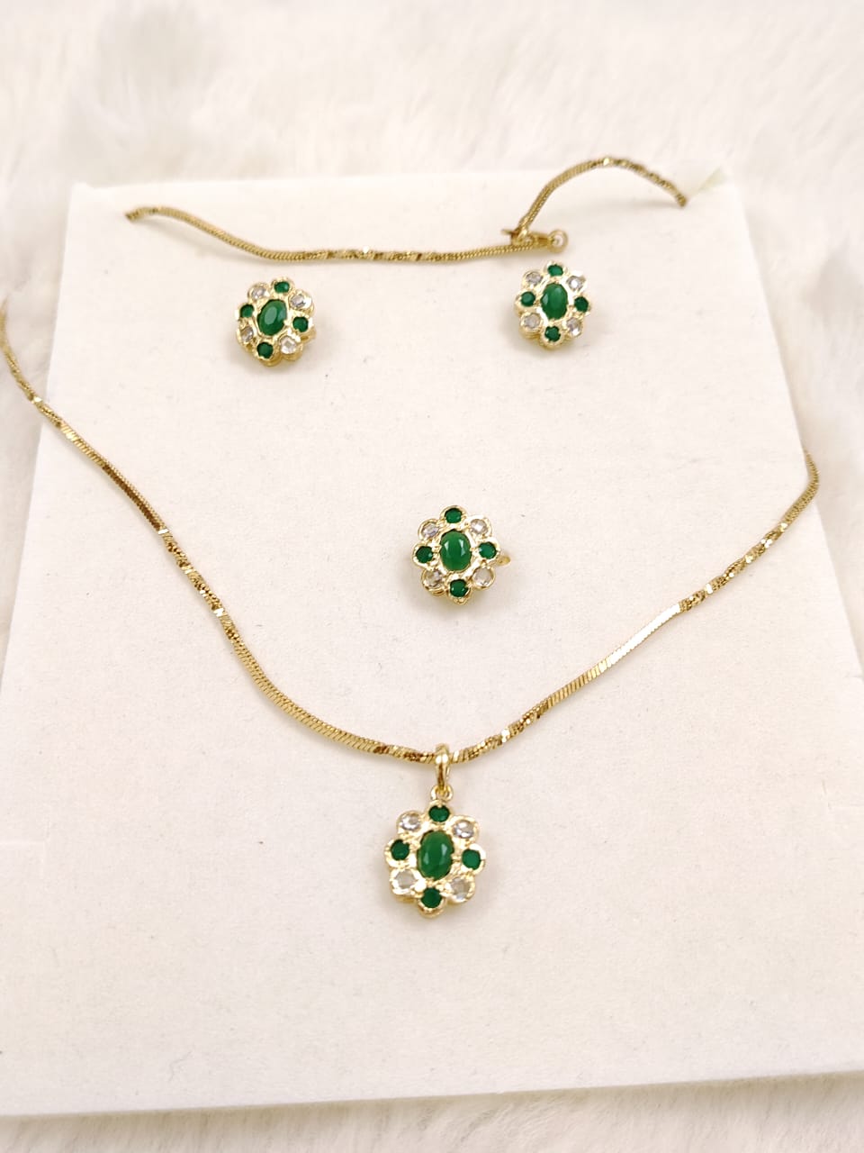 Pendant set with chain and finger ring- polki and emerald stones.